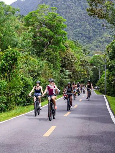 A group riding E-Valley bikes through El Valle de Antón
